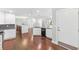 Open concept kitchen with stainless steel appliances, granite countertops, and eat-in island at 347 Chip Rd, Stone Mountain, GA 30087