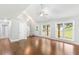 Spacious living area with hardwood floors, large windows, and easy access to the backyard at 347 Chip Rd, Stone Mountain, GA 30087