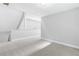 Spacious room with neutral carpet and ample natural light at 347 Chip Rd, Stone Mountain, GA 30087