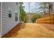 Large backyard is complimented by a wood fence, providing privacy at 4700 Blake Loop, Atlanta, GA 30349