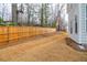 Large backyard featuring a wooden fence, providing privacy and security at 4700 Blake Loop, Atlanta, GA 30349