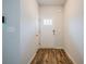 Bright entryway featuring modern flooring and a stylish front door with glass accents at 4700 Blake Loop, Atlanta, GA 30349