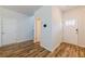 Welcoming entryway featuring modern flooring and multiple doors, providing easy access to the home at 4700 Blake Loop, Atlanta, GA 30349