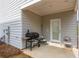 Covered patio area with grill, ideal for outdoor cooking and entertaining at 4700 Blake Loop, Atlanta, GA 30349