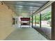 Covered outdoor patio with a swing, wood supports and a view of the backyard at 4817 Overland Dr, Powder Springs, GA 30127