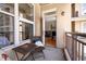 Relaxing balcony area with seating and a view through to the living room at 1101 Juniper Ne St # 1216, Atlanta, GA 30309