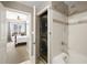 Bathroom featuring laundry closet with stackable washer and dryer, and shower/tub combo at 1101 Juniper Ne St # 1216, Atlanta, GA 30309