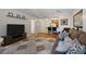 The living room features wood floors, a neutral color palette, and an open-concept layout to the kitchen at 1101 Juniper Ne St # 1216, Atlanta, GA 30309