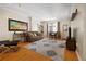 The living room features wood floors, a neutral color palette, and an open-concept layout at 1101 Juniper Ne St # 1216, Atlanta, GA 30309