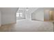 Expansive bonus room offers natural light and potential for versatile use at 1585 Oak Meadows Ln, Cumming, GA 30041