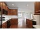 Gourmet kitchen with modern appliances, spacious counters, and hardwood floors for a seamless flow at 1585 Oak Meadows Ln, Cumming, GA 30041