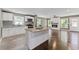 Modern kitchen with white cabinets, granite countertops, and stainless steel appliances at 3034 Barksdale Cir, Atlanta, GA 30344