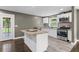 Updated kitchen featuring granite countertops, stainless steel appliances, and a convenient center island at 3034 Barksdale Cir, Atlanta, GA 30344