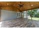 Inviting screened porch with wood ceiling, offering a relaxing outdoor space at 3034 Barksdale Cir, Atlanta, GA 30344