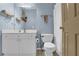 Bathroom with a white vanity, toilet, and a shower with a curtain at 4218 Sandy Branch Dr, Buford, GA 30519