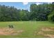Open field with a soccer net and bench at 4218 Sandy Branch Dr, Buford, GA 30519