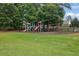 Community playground with swings and slides at 4218 Sandy Branch Dr, Buford, GA 30519
