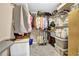 Organized walk-in closet with ample shelving and hanging space for clothes and accessories at 4218 Sandy Branch Dr, Buford, GA 30519