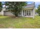 Backyard featuring well-maintained grass and a patio at 7008 Glen Valley Way, Fairburn, GA 30213