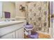 Bathroom featuring neutral paint, bath tub, and neutral shower curtain at 7008 Glen Valley Way, Fairburn, GA 30213