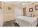 Cozy bedroom featuring neutral paint, plush carpet, and a ceiling fan at 7008 Glen Valley Way, Fairburn, GA 30213