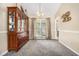 Dining room with neutral paint, large window, and carpet at 7008 Glen Valley Way, Fairburn, GA 30213