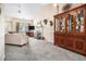Open-concept living room featuring a fireplace and elegant decor at 7008 Glen Valley Way, Fairburn, GA 30213
