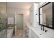 Modern bathroom boasting double sinks, stylish tile work, and a luxurious soaking tub at 2235 Birchtree Way, Marietta, GA 30062