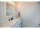 Well-lit bathroom featuring a white vanity, modern fixtures, and ample counter space at 2235 Birchtree Way, Marietta, GA 30062