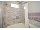 Clean bathroom with a shower-tub combo, white tile, and a modern vanity with a silver faucet at 2235 Birchtree Way, Marietta, GA 30062