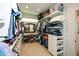 Walk-in closet with custom shelving, organizers, rods, and shoe racks to maximize storage at 2235 Birchtree Way, Marietta, GA 30062