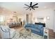 Spacious living area with hardwood floors, a stylish rug, and views of the open kitchen at 2235 Birchtree Way, Marietta, GA 30062