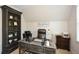 Well-appointed home office featuring a stately desk, bookshelf, and comfortable workspace at 2235 Birchtree Way, Marietta, GA 30062