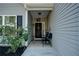 Charming front porch with 'Welcome' sign and seating at 504 Cole Creek Dr, Dallas, GA 30157
