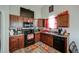 Practical kitchen featuring hardwood floors and essential appliances at 504 Cole Creek Dr, Dallas, GA 30157