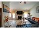 Bright living room with hardwood floors, fireplace, and comfortable seating arrangements at 504 Cole Creek Dr, Dallas, GA 30157