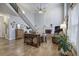 Open living room featuring a staircase, fireplace, and natural light at 5327 Saville Nw Dr, Acworth, GA 30101