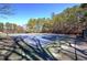 Community tennis court with surrounding trees at 5327 Saville Nw Dr, Acworth, GA 30101