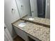 Bathroom with double sinks, granite countertops, and a large mirror at 5755 Belmont Ridge Cir, Lithonia, GA 30038