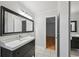 Bathroom featuring modern single vanity and neutral finishes at 209 14Th Ne St # 109, Atlanta, GA 30309