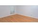 Bedroom featuring hardwood floors, neutral paint, and a window at 209 14Th Ne St # 109, Atlanta, GA 30309