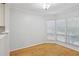 Bright dining area featuring hardwood floors, neutral paint, and bay window at 209 14Th Ne St # 109, Atlanta, GA 30309