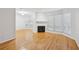 Spacious living room with a fireplace, large windows, and hardwood floors at 209 14Th Ne St # 109, Atlanta, GA 30309