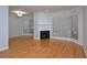 Bright living room with hardwood floors, fireplace, and large windows at 209 14Th Ne St # 109, Atlanta, GA 30309