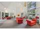 Elegant lobby with large windows, high ceilings, and comfortable seating area at 209 14Th Ne St # 109, Atlanta, GA 30309