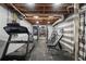 Basement gym features a treadmill, free weights and custom wall art at 23 Hunting Creek Dr, Marietta, GA 30068