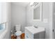 Clean half-bathroom with modern sink and toilet at 23 Hunting Creek Dr, Marietta, GA 30068