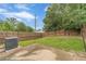 Well-maintained backyard featuring a concrete patio, an A/C unit, and a wooden fence for privacy at 2500 Morgan Chase Dr, Buford, GA 30519