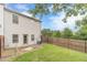 Great backyard with a small concrete patio, and a wooden fence, perfect for outdoor living and relaxation at 2500 Morgan Chase Dr, Buford, GA 30519