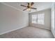 Bedroom featuring carpet, neutral walls, and bright natural light at 2500 Morgan Chase Dr, Buford, GA 30519